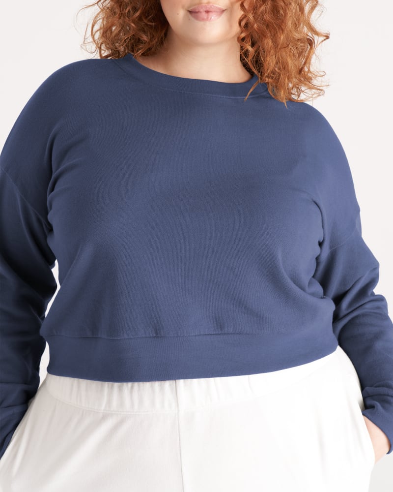 Front of a model wearing a size 5X The Cropped Sweatshirt in Midnight by The Standard Stitch. | dia_product_style_image_id:250517
